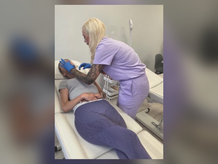 Lisa carrying out a treatment